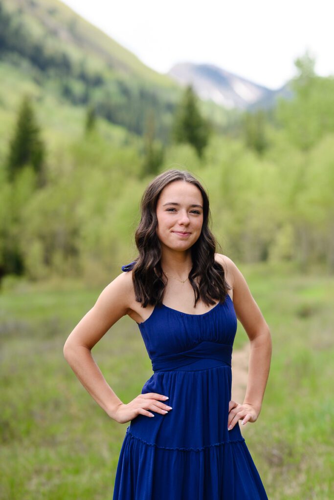 Ashcroft ghost town senior photos with the Colorado Rocky Mountains in the background as captured by a denver senior photographer