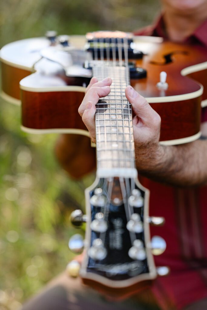 A closeup of guitar frets captured by a Denver Branding photographer and brand strategist.